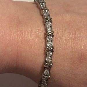 Beautiful tennis bracelet it’s white and yellow tone very lovely